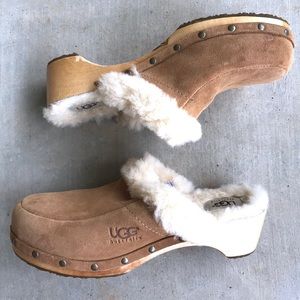 fur lined wooden clogs